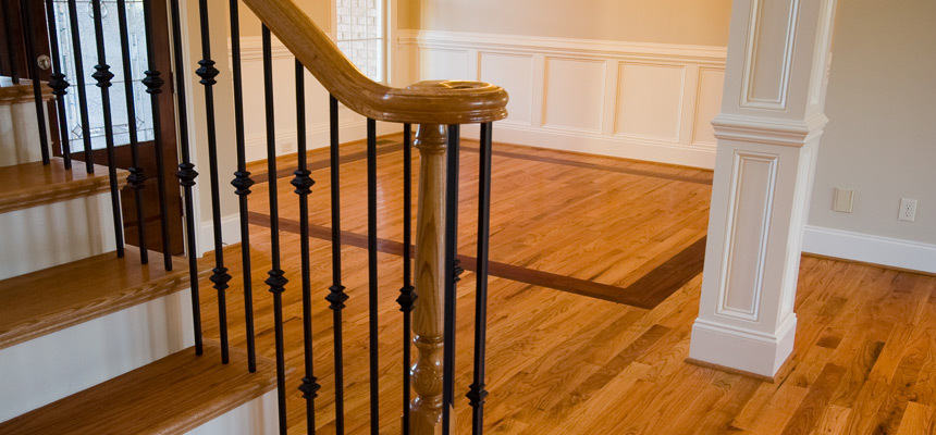 Quebe Flooring | About Us | Oak Hardwood Installation with Inlay